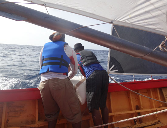 dropping sand during an anguilla boat race