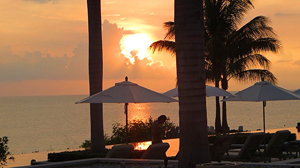 sun setting in anguilla at four seasons resort