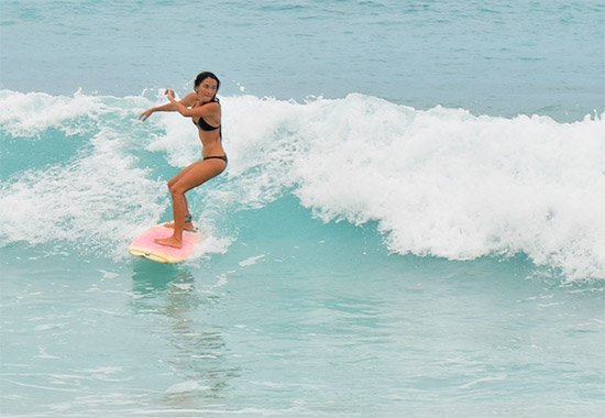 surfing small waves at meads