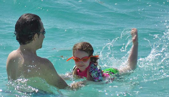 father and daughter in the water at rendezvous