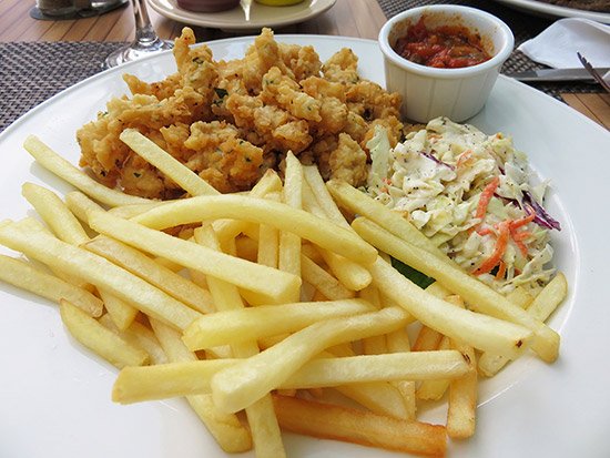 cracked conch lunch at tropical sunset