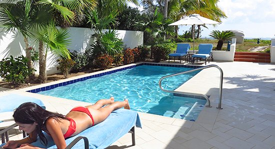 yuki enjoying the pool at the pool suite