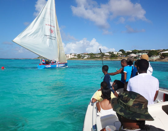 zharnel hughes following anguilla's national sport of boat racing