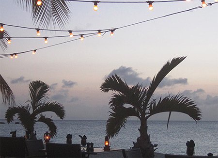evening time at straw hat restaurant on meads bay, anguilla